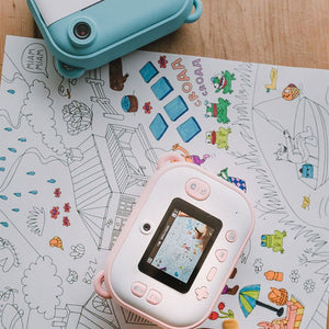 Kids instant print camera in pink with coloring markers and creative drawing sheet