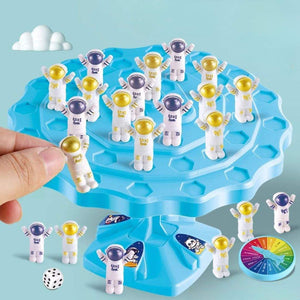 Children playing the Balance Astronaut Stacking Game with colorful astronaut pieces and dice