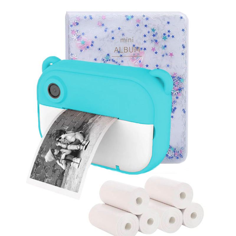 Kids instant print camera with thermal paper rolls and mini photo album in blue, perfect for creative instant black-and-white prints