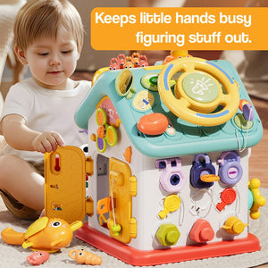 Montessori Busy House toy for toddlers with doors, buttons, switches, and lights to develop fine motor skills and coordination