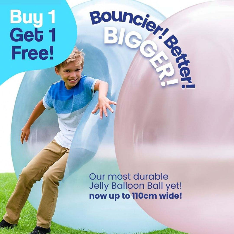 Child playing with large blue and pink Giant Jelly Balloon Ball outdoors with buy one get one free offer text