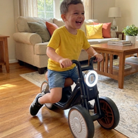 Patricia’s granddaughter on the Tiny Biker